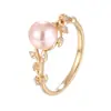 Anillo de Venta Caliente Transfronterizo Ramas y Hojas de Vid Exquisitas Europeas y Americanas con Perlas Rosas Encuentro Diamante Incrustado Arte Venta Directa de Fábrica