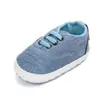 Comercio exterior nueva tendencia zapatos casuales de lona zapatos de bebé suela suave antideslizantes zapatos para niños pequeños zapatos de bebé al por mayor 0938