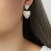 Pendientes con textura de doble capa y diseño de estrella con nicho de personalidad, colgantes de acero de titanio chapados en oro, venta al por mayor