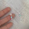 Pendientes de mariposa elegantes y exquisitos de estilo coreano para mujer, aretes asimétricos de lujo con luz de nicho de piedra lunar, aretes con sentido de diseño avanzado