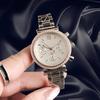 Reloj de moda para mujer, reloj de mano rápido, suministro en vivo, reloj decorativo de tres ojos, famoso reloj de diamantes de oro.