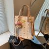 Bolsos pequeños populares transfronterizos para mujer en verano de 2025 Nuevo diseño nicho Bolso bandolera Estilo coreano Bolso tote de mano