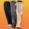Pantalones para hombre con forro polar Pantalones deportivos gruesos para hombre Otoño e invierno Cálidos Pantalones deportivos de forro polar de cordero Sueltos Talla grande Pantalones casuales