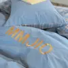 2026 Nuevo Todo Algodón Algodón Puro Algodón Lavado Moda Bordado Dormitorio Estudiantil Cama Individual Juego de Tres o Cuatro Piezas