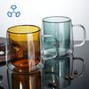 Vaso de vidrio de doble capa resistente al calor hecho a mano para el hogar con asa, forma trapezoidal, vaso de agua multiusos de alta temperatura resistente de alto borosilicato