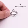 Joyería de Plata Miao Accesorios de Minoría Étnica Joyería de Aluminio Imitación Plata Miao Ropa Étnica Accesorios DIY Triángulo Grande Bilateral Durazno