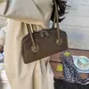 Bolsa de boliche, bolsa de ombro, bolsa versátil de nicho feminina para outono, casual, para o dia a dia, bolsa de ombro estilo retrô novo, moda 2026
