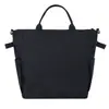 Bolso de mano minimalista estilo workwear de un solo hombro, bolsa cruzada de doble uso, resistente al agua, correa de hombro ajustable, bolso tote con logo impreso
