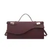 Bolso de Axila de Moda 2026 Nuevo Elegante Textura Retro Bolso de Mano Diseño de Nicho Para Viajes Diarios Un Solo Hombro Cruzado Bolso Pequeño