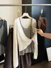 Elegante top de punto a rayas de dos piezas falsas retorcidas para mujer, nuevo estilo coreano de otoño, ajuste ceñido, manga larga, blusa única