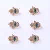 Personalidad europea y americana ojo de diablo palma pequeña aleación gota de aceite taladro accesorios de joyería colgante simple accesorios venta al por mayor