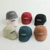 Bordado de letras de dibujos animados para niños, cara sonriente, corto a lo largo de la gorra de béisbol, versión coreana de todo a juego para niños y niñas, bebé, gorra de béisbol para exteriores, venta al por mayor