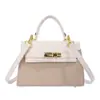 Bolsa Vintage de Nicho para Mulheres 2026 Elegante Bolsa Kelly de Retalhos em Camurça para o Dia a Dia Bolsa de Ombro Transversal