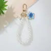 Nuevo Llavero Colgante Elegante de Flor de Perlas y Cuentas de Lujo Accesible Estilo Ins Exquisito Colgante de Flor de Perla para Bolso