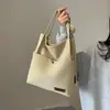 Bolso informal de gran capacidad para mujer, bolso de hombro de moda de verano, bolso de lona sencillo y combinable, bolso escolar para estudiantes universitarios.