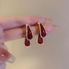 Pendientes de Cruz Únicos con Esmalte de Goteo Nuevo Estilo 2026 Pendientes Elegantes Diseño de Nicho Lujo Ligero Pendientes de Alta Gama para Mujer
