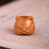 Talla de madera de sándalo adorable tigre raíz de Bodhi pintado cabeza de tigre pequeña año del tigre diy pequeño colgante accesorios accesorios venta directa de fábrica