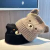 Gorro de punto de dibujos animados para mujer, lindo y dulce, gorro versátil para otoño e invierno, cálido, protector de orejas, favorecedor del rostro, sombrero de lana para clima frío