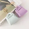 Nuevo Monedero Creativo Color Caramelo Llavero de Auriculares Moda Femenina Bolso de Almacenamiento de Cuero Versátil Colgante Regalo