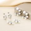 Sencillos aretes de acero inoxidable con forma de C y perlas de alta gama al por mayor para mujer, moda, lujo ligero, forma especial