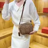 Bolso de mujer de alta gama, nuevo modelo 2026, casual y versátil para todas las estaciones, elegante bolso tipo cámara con correa ancha para llevar al hombro o cruzado