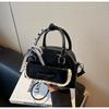 2025 Bolsa Popular de Nicho com Laço Moda Feminina Bolsa Transversal Simples Versátil Bolsa Bowling Portátil de Alta Qualidade