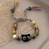 Pulseira feminina nova estilo chinês colorida com contas de cerâmica gato personalidade tendência novo design de nicho pulseira tecida à mão