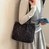 Bolso tote estilo coreano de chica dulce con estrellas de lámina dorada, diseño de cielo estrellado y colgante de estrella de mar, moderno y juvenil, bolso de hombro simple