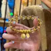 Nuevo Estilo Chino Lujo Cristal Imitación Pulsera con Cuentas Doradas Pulsera de Moda de Gama Alta con Etiqueta de Plata Rota Dios de la Riqueza