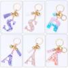 Llavero acrílico creativo con borla y letras para equipaje de señora, accesorio para llaves, colgante con letras