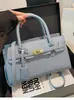 Bolso de Mano con Patrón de Lichi Transfronterizo para Mujer 2026 Nuevo Bolso de Hombro Cruzado de Moda Europea y Americana Elegante Bolso Kelly para Viajes Diarios para Mujer