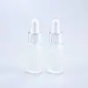 Botella gotero esmerilada con puntos 5ml 10ml 15ml 20ml Botella de vidrio transparente Botella de aceite esencial Botella de líquido de esencia Empaque