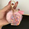 Suministra y Vende Llaveros con Alfabeto de 26 Letras en Forma de Corazón de Colores con Pompoms y Borlas, Colgantes para Llaves para Bolsos de Mujer