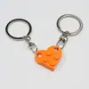 Lindo y Fresco Llavero de Amor con Puzzle de Lego Se Puede Ensamblar y Dividir Bloques de Construcción Accesorios de Llavero para Pareja Venta al Por Mayor