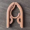 Percha de viaje plegable mágica multifuncional, portátil, retráctil, para el hogar, pequeña