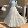 Elegante y delicado estilo falda de pastel plisada para mujer, nuevo modelo otoño e invierno 2026, con efecto adelgazante, línea A, dobladillo amplio, falda larga de malla