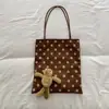Bolso tote retro de ante con lunares para mujer, nuevo estilo 2026, bolso de hombro versátil, bolso para el día a día