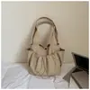 Bolsa bucket casual plissada elegante e simples estilo coreano, novo modelo primavera 2026, bolsa de mão e bolsa de ombro de alta aparência para o dia a dia