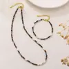 Fábrica de Origen Pulsera de Acero de Titanio Piedra Natural Ojo de Tigre Perla de Agua Dulce Pulsera de Obsidiana Negra Mercancía de Puesto Origen Exportación Transfronteriza