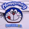 Parche Adhesivo Suave DIY Doraemon Gato Robot Doraemon Cascabel Taza de Agua Funda para Teléfono Móvil Cubierta Plana Accesorios Hebilla de Zapato Personalización