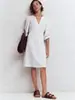 Vestido camisa casual de manga larga de color liso con cuello en V para mujer, estilo europeo y americano, otoño nuevo, corte holgado, vestido línea A entallado a la cintura