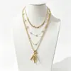 Cadena de Perlas Oceánicas de Venta Caliente Transfronteriza Europea y Americana Cadena para Clavícula de Mujer Colgante de Estrella de Mar y Concha Collar Multicapa Apilable Venta al por Mayor