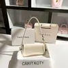 Una generación de bolso baguette de alta gama 2025 primavera nuevo lujo nicho bolso de axila bolso de hombro al por mayor