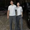 Camisa Polo para Hombre de Manga Corta con Cuello Henley Gris Americano Cleanfit Lujo Ligero Camiseta de Hombro Real Ajustada Estilo Nuevo 2026