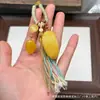 Cera de Abeja de Segunda Generación Varios Estilos Oso Bolsa de Queso Colgante Llavero DIY Exquisito Adorno de Joyería