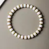 Pulsera de Bodhi de Jade Blanco 0.6 Incrustada a Mano Pulida en Seco Redonda Estilo Rosario Nuevo Estilo Chino Venta al por Mayor
