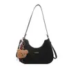 Bolso de axila retro con forma de media luna para mujer, nueva colección principios de otoño 2026, diseño de nicho, alto atractivo estético, bolso de hombro simple, bolso cruzado, estilo transfronterizo