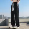 Pantalones de verano sueltos de pierna recta azul claro con cintura elástica, jeans casuales de tendencia de pierna ancha de la alta calle americana para hombre
