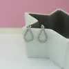 Corea del Sur Dongdaemun comprando los mismos pendientes de aguja de plata 925 diseño sentido de temperamento diario gotas de agua Pendientes súper de hadas pendientes
