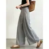 Nueva colección de principios de otoño 2026: Pantalones grises de pierna ancha para mujer en un estilo clásico y sofisticado, con un corte recto holgado, una caída favorecedora y un efecto adelgazante, perfectos para uso casual
